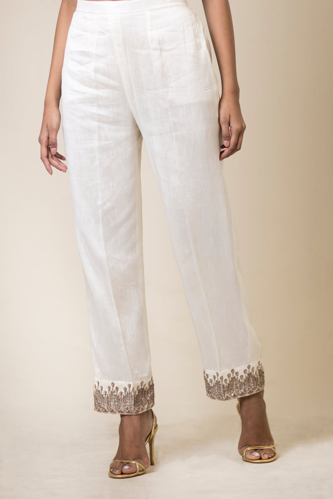 White Straight Pants With Lace Work On Flares | cotrasworld